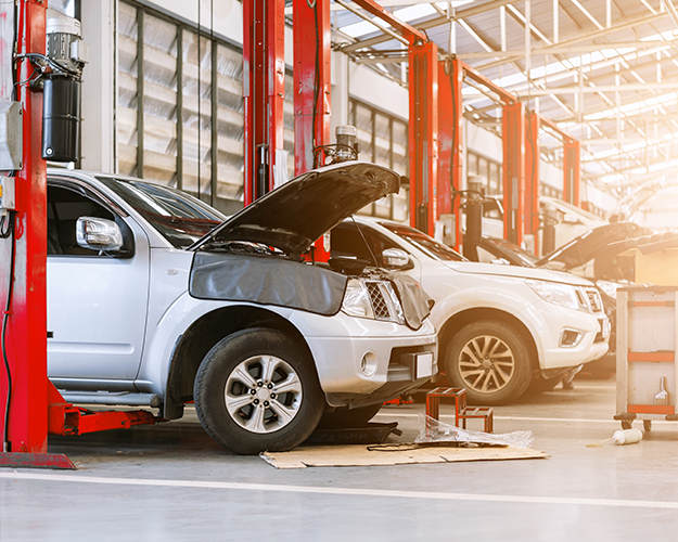 SUVs on lifts auto repair